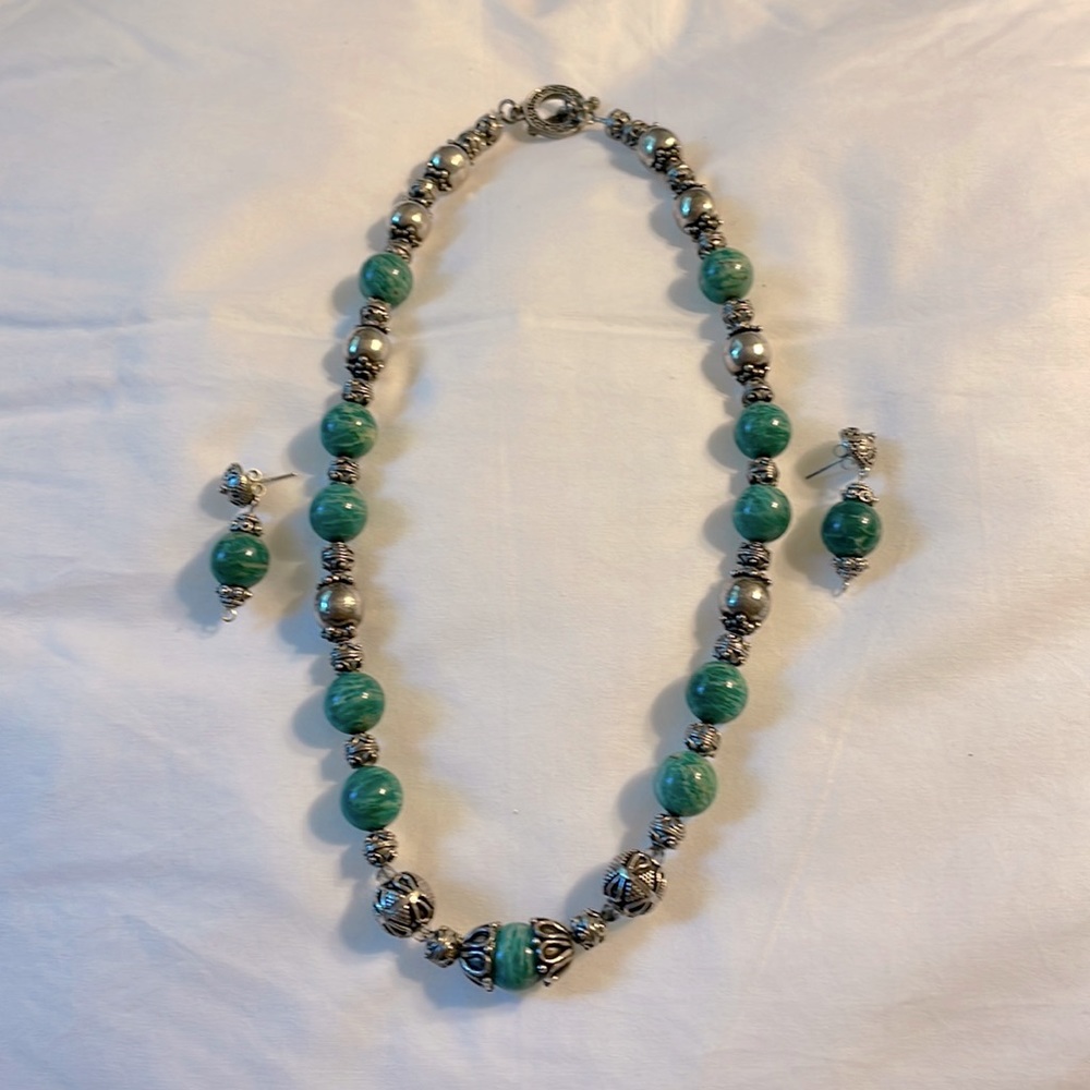 Silver and green stone necklace and earring set